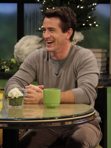 Dermot Mulroney has a laugh on the set of Access Hollywood Live on December 7, 2011

