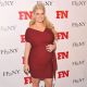 Jessica Simpson shows off her baby bump at the 25th Annual Footwear News Achievement Awards at the Museum of Modern Art in New York City on November 29, 2011
