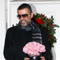 George Michael gives a press conference outside his North London Home in London on December 23, 2011 