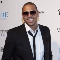 Chris Brown poses at PURE Nightclub inside Caesars Palace in Las Vegas on December 31, 2011