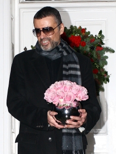 George Michael gives a press conference outside his North London Home in London on December 23, 2011 