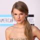 Taylor Swift arrives at the 2011 American Music Awards held at Nokia Theatre L.A. LIVE in Los Angeles on November 20, 2011