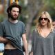 Tom Sturridge and Sienna Miller are seen walking their dog in Notting Hill in London on September 17, 2011