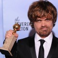 The winner for Best Performance by an Actor in a Supporting Role in a Series, Mini-Series or Motion Picture Made for Television Peter Dinklage poses with the trophy at the 69th annual Golden Globe Awards at the Beverly Hilton Hotel in Beverly Hills, January 15, 2012