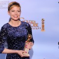 Michelle Williams poses with the trophy for Best Performance by an Actress in a Motion Picture Comedy or Musical for ‘My Week with Marilyn’ at the 69th annual Golden Globe Awards at the Beverly Hilton Hotel in Beverly Hills