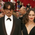 Johnny Depp and Vanessa Paradis attend the 80th Annual Academy Awards at the Kodak Theatre in Los Angeles on February 24, 2008