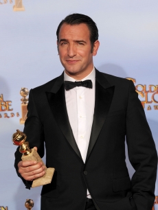 Jean Dujardin poses in the press room with the Best Performance by an Actor in a Motion Picture - Musical or Comedy award for ‘The Artist’ at the 69th Annual Golden Globe Awards held at the Beverly Hilton Hotel, Beverly Hills, on January 15, 2012