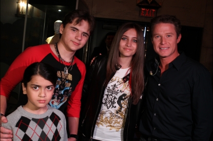 Blanket, Prince and Paris Jackson pose with Access’ Billy Bush at the Michael Jackson hand and footprint ceremony in Hollywood on January 26, 2012