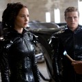 Katniss Everdeen (Jennifer Lawrence, left), Peeta Mellark (Josh Hutcherson, center) and Cinna (Lenny Kravitz, right) in ‘The Hunger Games’