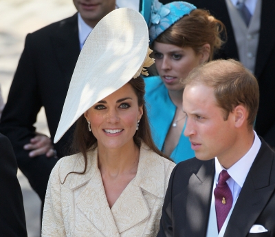 Catherine, Duchess of Cambridge and Prince William, Duke of Cambridge leave Canongate Kirk on the afternoon of the wedding of Mike Tindall and Zara Philips in Edinburgh, Scotland, on July 30, 2011 