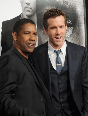 Denzel Washington and Ryan Reynolds are seen at the ‘Safe House’ premiere in New York City on February 7, 2012