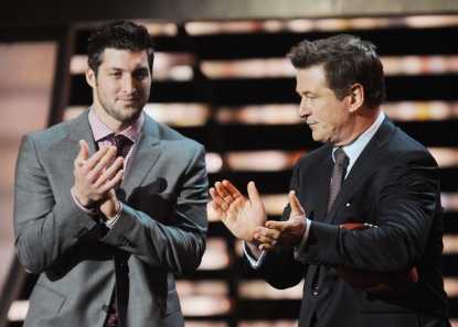 Tim Tebow and Alec Baldwin speak onstage at the 2012 NFL Honors at the Murat Theatre in Indianapolis, Ind., on February 4, 2012 