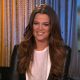 Khloe Kardashian flashes a smile on Access Hollywood Live on February 10, 2012
