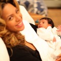 Beyonce holds baby Blue Ivy Carter in a photo posted on Jay-Z’s site LifeAndTimes.com
