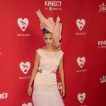 Katy Perry rocks a large pink hat at the 2012 MusiCares Person of the Year Tribute To Paul McCartney held at the Los Angeles Convention Center on February 10, 2012