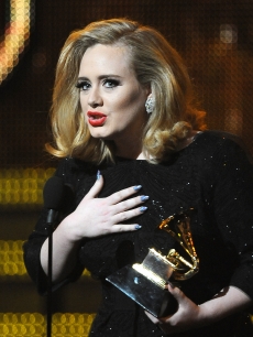 Adele speaks onstage after receiving her the Best Pop Solo Grammy award at the Staples Center during the 54th Grammy Awards in Los Angeles on February 12, 2012