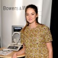 Shailene Woodley checks out a pair of Bowers & Wilkins headphones at the Official Presenter Gift Lounge at the 2012 Film Independent Spirit Awards at Santa Monica Pier in Santa Monica, Calif. on February 25, 2012
