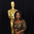 Oprah Winfrey poses at the Academy Awards, Hollywood, February 26, 2012