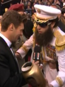 Ryan Seacrest gets ashes dumped on him by Sacha Baron Cohen as ‘The Dictator’ on E! Live at the Academy Awards, Hollywood, February 26, 2012