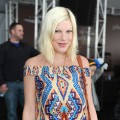 Tori Spelling sports a print dress at John Varvatos 9th Annual Stuart House Benefit held at John Varvatos Los Angeles in West Hollywood, Calif. on March 11, 2012