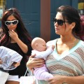 Nicole ‘Snooki’ Polizzi and Jenni ‘JWoww’ Farley cradle their baby dolls, seen on location for ‘Snooki and JWoww vs. the World’ in Jersey City, NJ, on March 23, 2012