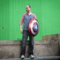 Joss Whedon stands in a shot on ‘Marvel’s The Avengers’
