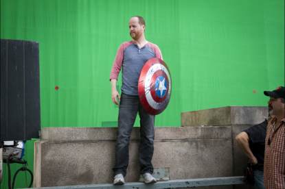 Joss Whedon stands in a shot on ‘Marvel’s The Avengers’
