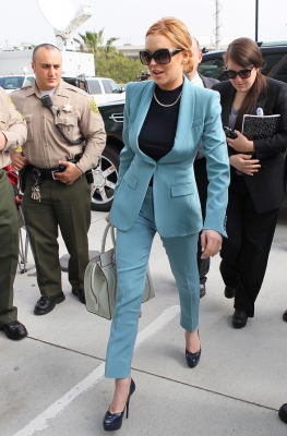 Lindsay Lohan - in a teal pant suit - arrives at the LAX Courthouse to attend a final status hearing relating to the criminal cases against her in Los Angeles on March 29, 2012