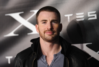 Chris Evans arrives at Tesla Worldwide Debut of Model X in Los Angeles on February 9, 2012