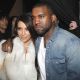 Kim Kardashian and Kanye West attend the Kanye West Ready-To-Wear Fall/Winter 2012 show as part of Paris Fashion Week at Halle Freyssinet in Paris on March 6, 2012