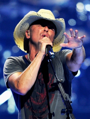 Kenny Chesney performs onstage at the iHeartRadio Music Festival held at the MGM Grand Garden Arena, Nashville, on September 24, 2011