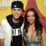 Justin Bieber and his mother Pattie Mallette att the 2011 CMT Music Awards on June 8, 2011