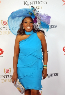 Star Jones is bright in blue as she arrives at the 138th Kentucky Derby at Churchill Downs in Louisville, KY, on May 5, 2012