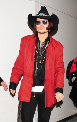 Johnny Depp rocks a western look while arriving at Narita International Airport Narita, Japan, on May 12, 2012