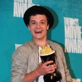 Josh Hutcherson poses with his award for ‘Best Male Performance’ for his role in ‘The Hunger Games,’ in the press room at the MTV Movie Awards at Universal Studios, in Los Angeles on June 3, 2012
