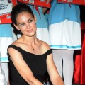 Katie Holmes is all smiles at the ‘Artistry on Ice’ press conference at Sheraton Hotel in Beijing, China on June 11, 2012