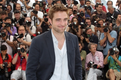 Robert Pattinson is all smiles during the photocall of ‘Cosmopolis’ presented in competition at the 65th Cannes film festival in Cannes on May 25, 2012
