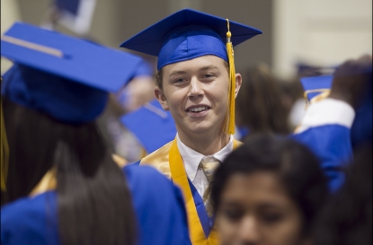 Scotty McCreery participates in his high school commencement ceremony on June 7, 2012 in Raleigh, North Carolina