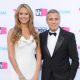 Stacy Keibler and George Clooney arrive at the 17th Annual Critics Choice Movie Awards at The Hollywood Palladium on January 12, 2012 in Los Angeles