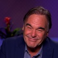 Oliver Stone Reminisces About Working With Charlie Sheen, Tom Cruise & Michael Douglas

