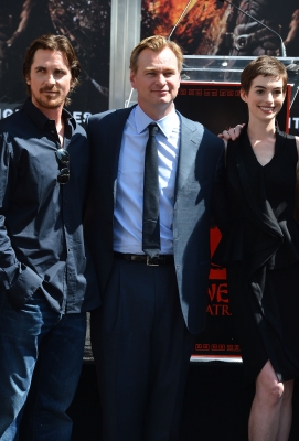 ‘The Dark Knight Rises’ stars Christian Bale and Anne Hathaway join director Christopher Nolan for his Hand and Footprint Ceremony for Nolan at Grauman’s Chinese Theatre on July 7, 2012 in Hollywood