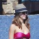 Jessica Alba shows off her post-baby body while spending the day poolside with husband Cash Warren and their daughters Haven and Honor in Cabo San Lucas, Mexico in December 2011