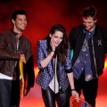 Taylor Lautner, Kristen Stewart, and Robert Pattinson accept the Ultimate Choice award onstage during the 2012 Teen Choice Awards at Gibson Amphitheatre in Universal City, Calif. on July 22, 2012