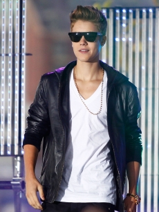 Justin Bieber performs on stage during the ‘Sunrise’ broadcast at the Overseas Passenger Terminal, Sydney, Australia, on July 18, 2012
