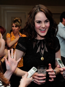 Michelle Dockery speaks with reporters after the ‘Downton Abbey’ panel at the TCA summer tour 2012 at the Beverly Hilton Hotel, July 21, 2012
