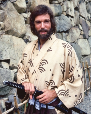 Richard Chamberlain, US actor, wearing a kimono and holding a samurai sword in a publicity portrait issued for the US television series, ‘Shogun’, Japan, 1980. The mini-series, adapted from the novel by James Clavell, starred Chamberlain as ‘Pilot-Major John Blackthorne’