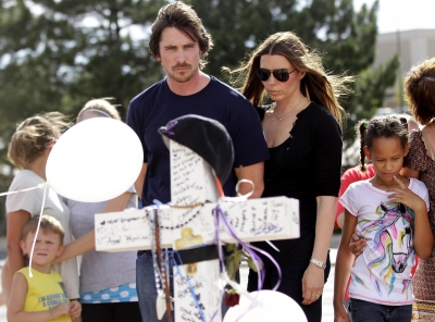 Christian Bale and Sandra Blazic reflect on the victims of last week’s mass shooting during the midnight screening of ‘The Dark Knight Rises’ in Aurora, Colorado on July 24, 2012