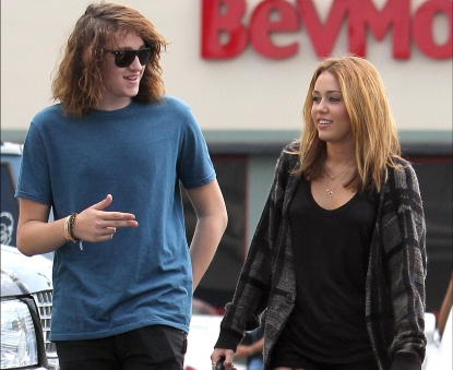 Miley Cyrus and Braison Cyrus are seen at Panera Bread bakery in Los Angeles on September 9, 2010