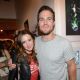 Stephen Amell (R) and Katie Cassidy attend DC Entertainment hosts ‘Darkness & Light’ party at San Diego Comic-Con International benefitting We Can Be Heroes held at Michael J. Wolf Fine Arts Gallery on July 12, 2012