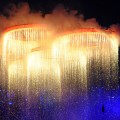 The Olympic rings are assembled above the stadium in a scene depicting the Industrial Revolution during the Opening Ceremony of the London 2012 Olympic Games at the Olympic Stadium in London on July 27, 2012